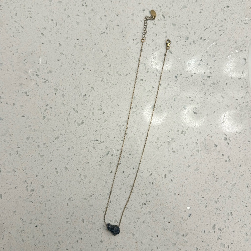 Alexis Russell raw blue Montana sapphire and 14k gold necklace